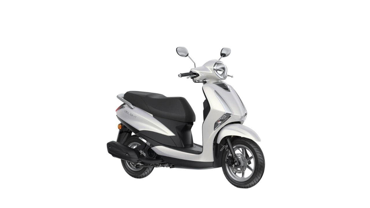 <div class='descrGalleryTitle'>CAMBIAMENTI</div><div class='descrGalleryText'><p>Il nuovo Yamaha D'elight presenta un nuovo design unisex della carrozzeria per il 2021, con un faro più arrotondato nonché indicatori di direzione a filo e una luce di posizione montata sul cupolino. Il&nbsp;cupolino ridisegnato offre un'eccellente protezione dal vento, mentre la spaziosa pedana piatta&nbsp;garantisce una posizione di guida confortevole e un facile accesso.</p>
</div>